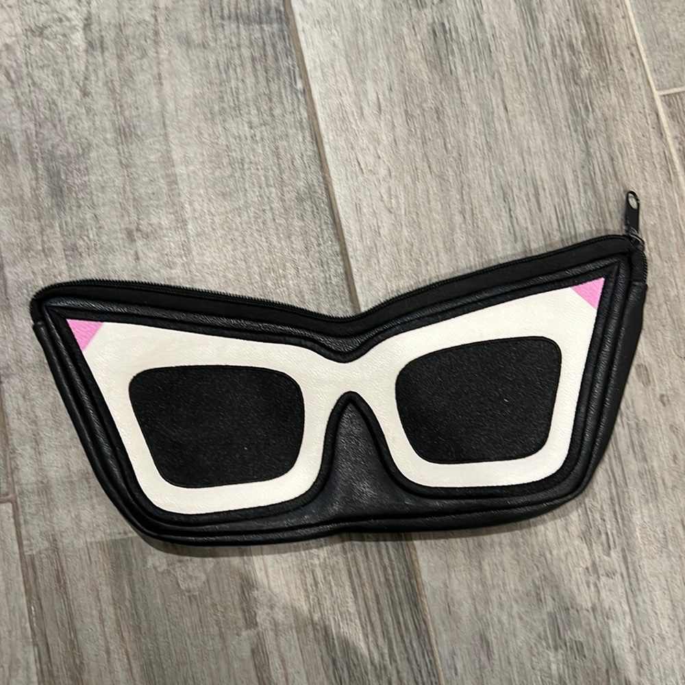 Cosmetic pouch in cat eye shape. Love Bravery by Lady Gaga and Elton John